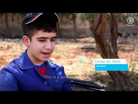 Ghazi and his classmates learn about agriculture at FAO school gardens